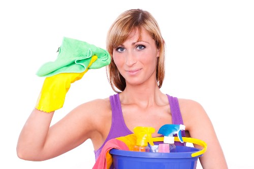 After builders cleaning removing dust from a renovated Haringey home