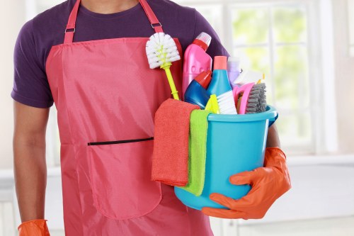 Professional carpet cleaning technician preparing equipment before service
